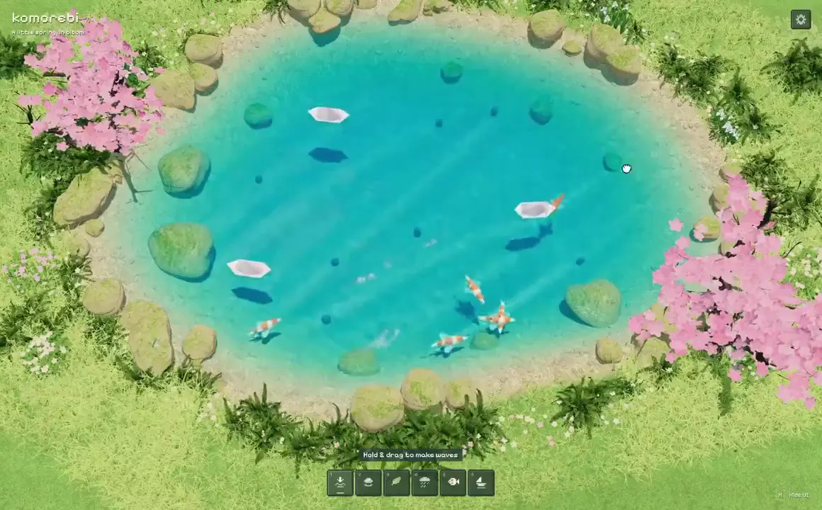 Frame from Koi pond beneath pink blossoms