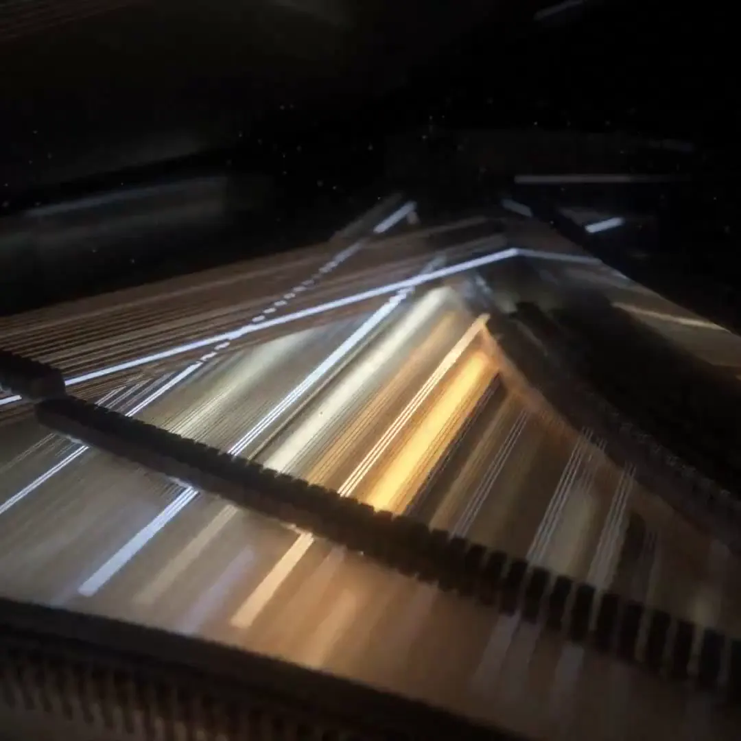 Frame from Light inside a grand piano