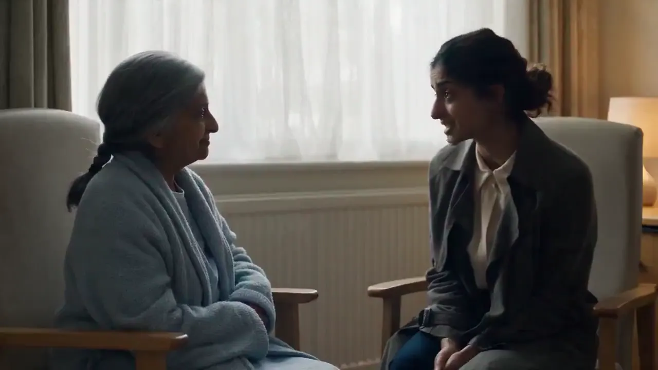 Frame from Mother and daughter beside a window