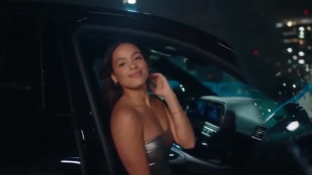 Frame from Night portrait in a black car doorway