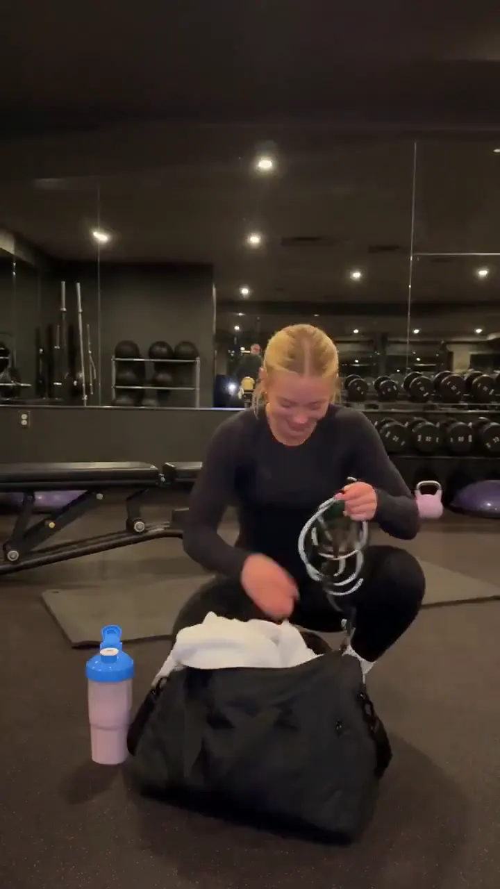 Frame from Post-workout routine in a dark gym