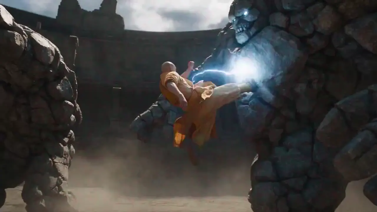 Frame from Saffron monk against stone giants