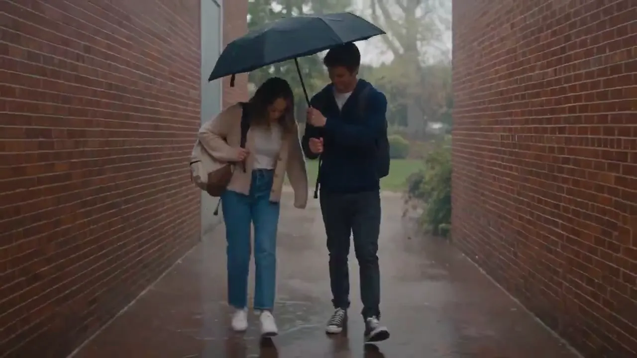 Frame from Shared umbrella on a rainy campus